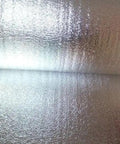 Close-up of Heavy Duty Reflective Foil Radiant Barrier Roof Underlayment 4 Ft X 250 Ft 1000 Sq Ft material with shiny surface.