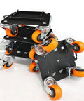 Super Heavy Duty Furniture Mover Dollies That Spin 360 Degrees Easy With Pry Bar And Heightening Pads For Moving Frig, Washer, Sofa And Couch Fast Without The Strain, featuring orange wheels and durable black surface.