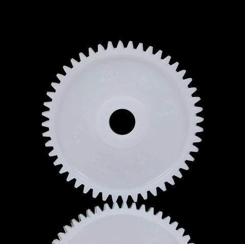 White large gear from 550 Gear Box Kit For Kids Ride On Cars All In One Large Middle And Small Gears Drive Accessories Set on black background