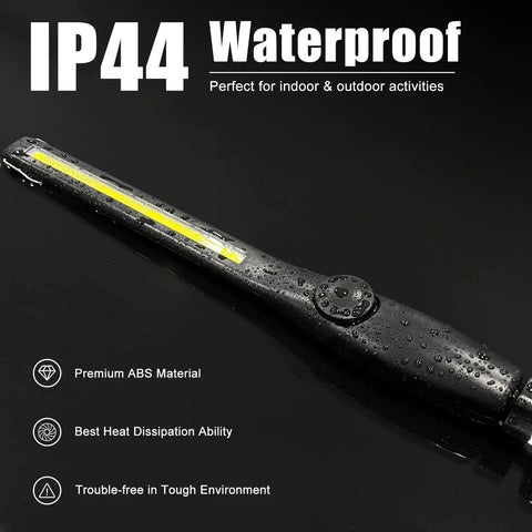Waterproof Bright As Heck LED Work Light 600LM Rechargeable COB With 2200mAh Battery, black handle on wet surface.