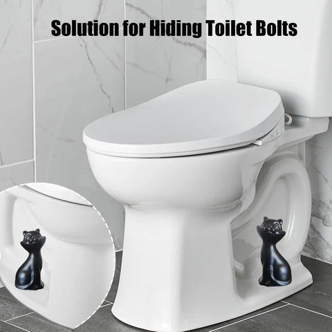 Chill Out Your Bathroom Look With This Ridiculously Cool Set Of Two Ceramic Cat Toilet Bolt Caps That Hides Exposed Bolts Hassle Free And Brings Serious Vibe In Matte Black on a toilet.