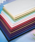 Stack of colorful 20 Pack Flower Wrapping Paper 22 By 22 Inches Waterproof Floral Bouquet Paper For Gift Bags