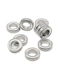 Amp Up Your Gear With Double Sealed Deep Groove Ball Bearings 10 Pack Size 6700ZZ 10X15X4mm steel bearings arranged in a group.