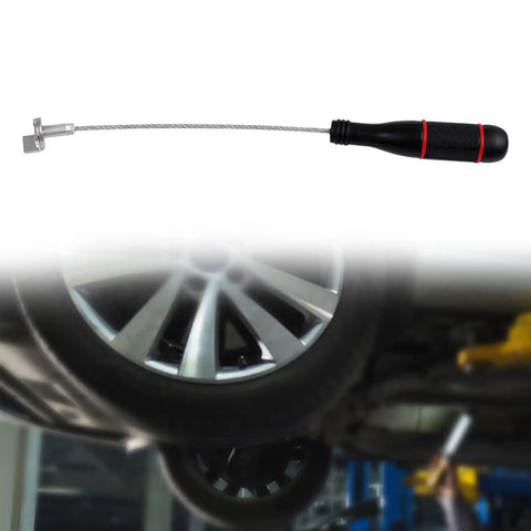 Oil Drain Plug Removal Tool Set With Bendable Steel Wire And Anti Slip PP Handle For Sump Screws Pick Up And Hold Wrench Style Oil Pan Plug Remover Two Pack, shown near wheel
