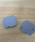 End Barrier DN ECM10 DNECM10 Terminal Block End Cap Kit Gray Pack Of 45 on wooden surface