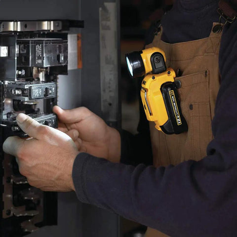 Worker using Go To Portable 12V Max LED Work Light with Magnetic Mount and Kickstand on electrical panel