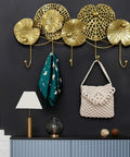 Gold Wall Mounted Coat Rack Featuring A Styled Lotus Leaf Design With Five Heavy Duty Hooks To Hang Outerwear Keys Caps And Towels. Decorative design with hooks.