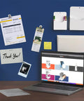 Magnetic Paint And Primer Water Based 32oz High Yield For Any Surface Make It Magnetic Easily for displaying documents and photos on blue wall.