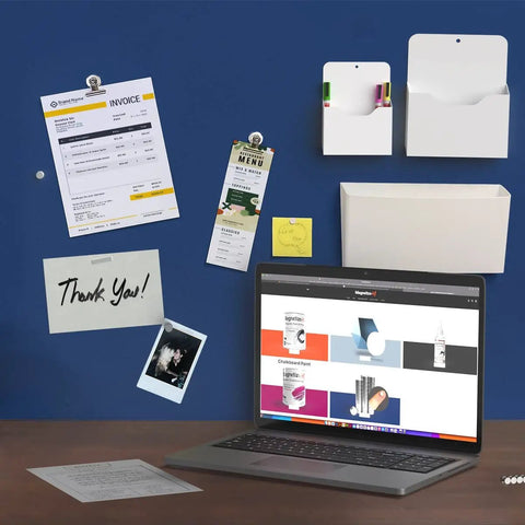 Magnetic Paint And Primer Water Based 32oz High Yield For Any Surface Make It Magnetic Easily for displaying documents and photos on blue wall.