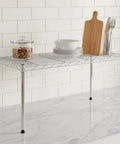 One Tier Steel Wire Shelving Unit With Adjustable Storage Rack Setup Measuring Thirty Inches By Fourteen Inches displaying kitchen items.