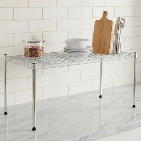 One Tier Steel Wire Shelving Unit With Adjustable Storage Rack Setup Measuring Thirty Inches By Fourteen Inches displaying kitchen items.
