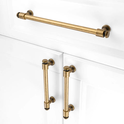 No Fuss Antique Brass Cabinet Pulls Ten Pack Five Inch Drawer Handles Heavy Duty Solid Metal Hardware With Smooth Rounded Edges on white cabinet.