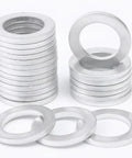 Stack of aluminum washers from 20 Piece Transmission Fluid Drain Plug Crush Washer Gasket Set For Honda Accord Civic CR V Ridgeline Odyssey