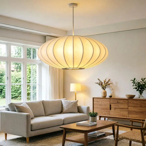 AFSEMOS 20" Japanese Wabi Sabi Pendant Light Silk Hanging Lantern Lamp above a cozy living room setup.