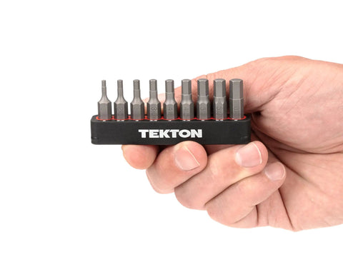 Hand holding One Quarter Inch Hex Bit Set With Rail, Nine Piece Extra Long 30 mm Bits, S2 Steel, Corrosion Resistant, For Recessed Fasteners