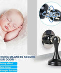 Solid Two Pack Black Magnetic Door Stop With Mounting Screws Holds Doors Tight And Catches Slamming Noise With Built In Spring Cushion For Easy Install, showing a 360-degree rotating design.
