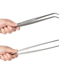 12 Inch Long Stainless Steel Tweezers And Nippers Set With Straight And Curved Tips Held In Hand, Serrated Jaws Visible