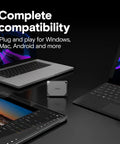 X9 Pro 1TB Portable SSD with up to 1050 MB per second read and write USB C 3.2 external drive next to laptops and tablet.