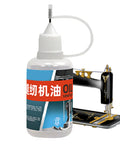 Industrial Grade High Temperature Sewing Machine Lubricant With Lightweight Formula for ultra smooth operation next to sewing machine.