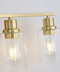 4 Light Gold Bathroom Vanity Light Fixture with Clear Glass Shades Brushed Brass Finish Modern Wall Sconce close-up view