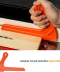 Person using Deluxe Featherboard Safety Kit With Long And Short Hold Down Push Blocks For Table Saws Router Tables Jointers And Band Saws