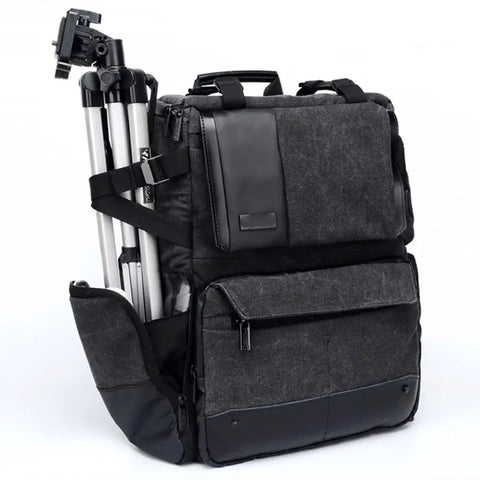 Big Capacity Laptop And DSLR Video Camera Backpack With All Weather Cover, side view with tripod in quick-access pocket.