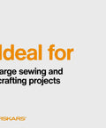 Fiskars self-healing cutting mat ad on gray background; orange Ideal for text and Fiskars logo
