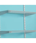 Expandable 26 Inch Shelf Kit Two Shelves White With Durable Epoxy Finish installed on wall in laundry pantry setting