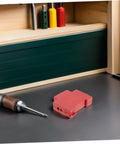 Ironclad Snap In Fire Suppression Case Featuring Condensed Aerosol Extinguisher Housing A Four Piece Kit on workbench