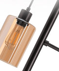 Close-up of one amber glass shade of the Industrial Floor Lamp With Amber Glass Shades Three Head Tree Design Tall Black Pole