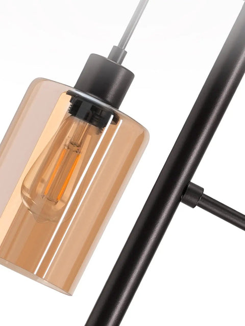 Close-up of one amber glass shade of the Industrial Floor Lamp With Amber Glass Shades Three Head Tree Design Tall Black Pole