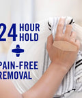 Person washing dishes with Painless-Removal Bandage visible on hand, showcasing 24-hour hold, water-resistant adhesive, and flexibility
