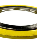 Spiral-wound gasket with yellow outer ring and metal inner bore for 32-inch pipe.