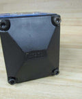 Side view of Bosch Rexroth R900590253 Hydraulic Valve with 4 screws on black base for industrial hydraulics