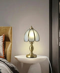 Retro Mushroom Table Lamp With Frosted Glass Shade And Brass Base on nightstand in bedroom, 7.4 Inch Wide By 13.7 Inch Tall