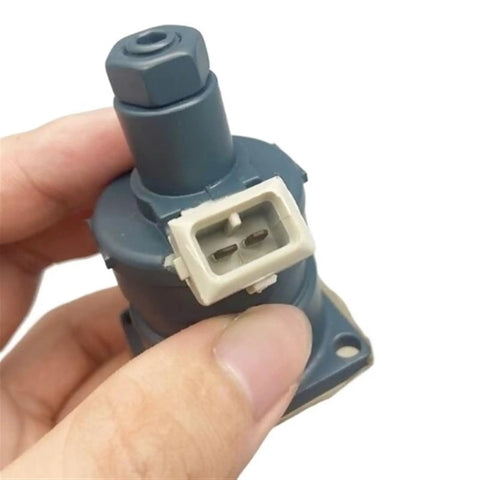 9218234 Heavy Duty Proportional Solenoid Valve For Excavator Hydraulic Systems With Two Pin Square Connector held in hand.