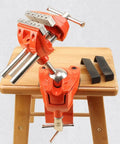 Shop Ready 3 Inch Heavy Duty Bench Vise With Rock Solid 360 Degree Ball Joint Tilt And Secure Clamp Mount For Garage Workshops Crafted From Durable Cast Steel Workshop Tools on a wooden surface.