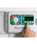 Person adjusting settings on Expandable ESPME3 Lawn Irrigation Controller for Indoor and Outdoor Use With 4 to 22 Stations