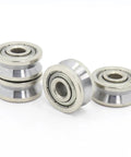 4 Pcs UV Groove Pulley Wheel Guide Bearings with smooth metal finish for high speed low noise operations.
