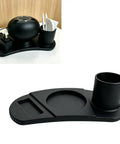 Chic Ultrasonic Cleaner Organizer Tray With Strainer Slot. Compact black plastic tray with compartments for storage.