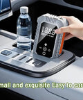 Portable Wireless Tire Inflator With Digital Pressure Gauge No Sweat Air Compressor For Cars Motorcycles Bikes And Balls Road Trip Ready Quick Fix in a car cup holder with a water bottle.