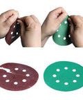 Awesome 100-Piece Set Of 5 Inch Sanding Discs With Hook And Loop Design For Wood Metal Projects featuring red and green discs being handled.