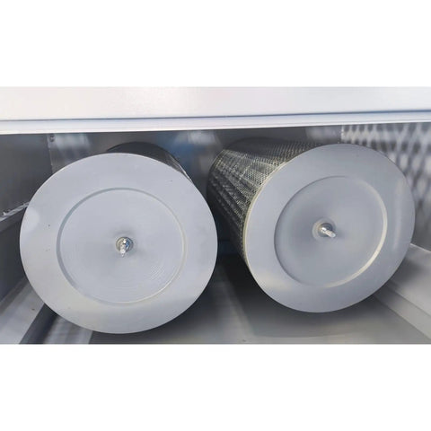 Inside view of dual drum dust collector filters for Straight Up Heavy Duty Metal Working Downdraft Table With Dual Drum Dust Collector And Welding Fume Extractor For Industrial Shop Grinding And Multi Stage Filtration 3KW 220V.