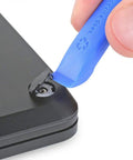 Using Essential Electronics Toolkit for DIY Home and Tech Repairs with Magnetic Bit Screwdriver 16 Precision Bits Opening laptop