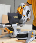 Person using 10-Inch Sliding Compound Miter Saw With Laser Guide, 15 Amp Bevel Chop Saw For Wood And Metal, cutting wood.
