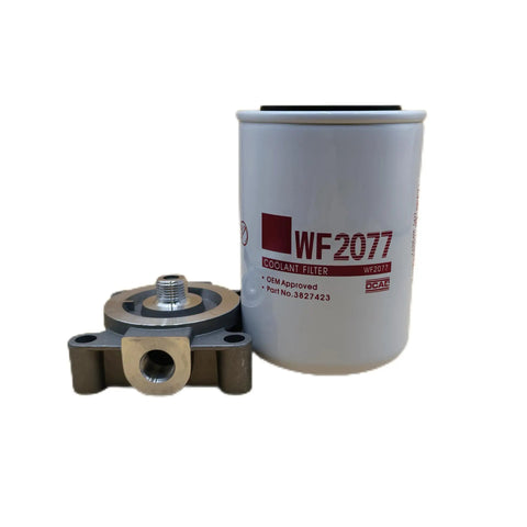 Coolant Filter With Base For Cummins B6.7 And ISL9 Engines Replacement P554685 WF2077 Cross Reference To Fleetguard John Deere Donaldson Three Eighths Inch NPT Spin On Head Fits Freightliner International Ford Peterbilt Kenworth Mack Trucks. Visible are the filter and spin-on head.