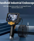 Real Deal 1080P Borescope Camera With Blinding LED Flash And Hella Sharp 4.3 Inch IPS Screen in handheld design, showcasing a detailed view of machinery.