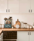 Kitchen cabinets with 30 Pack 5 Inch Matte Black Cabinet Pulls With Round Base For Kitchen Cabinets And Drawer Fronts, 3 Inch Center to Center Hole Spacing, Durable Metal Handles With Sleek Contemporary Design installed.