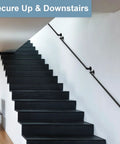 Heavy Duty Black Powder Coated Pipe Stair Handrail Six Foot Wall Mounted Corner Railing for Indoor Steps, shown along dark stairs.