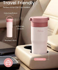 Portable Stainless Steel Breast Milk Chiller Keeps Bottles Chill For Up To Twenty Three Hours Creating A Rock Solid Choice For Pink Nursing Storage, shown in car cup holder.